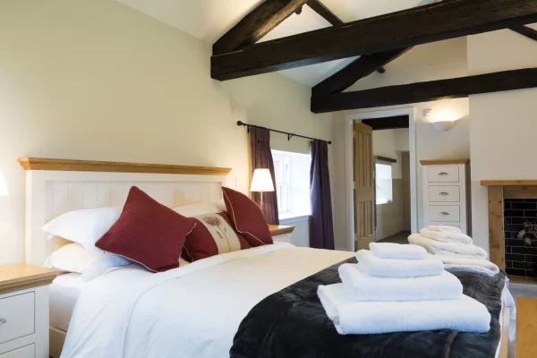 The Engineer Apartment at Netherby Hall boasts a sizable bedroom with a Kingsize bed with en-suite bathroom facilities including a fitted shower and bath