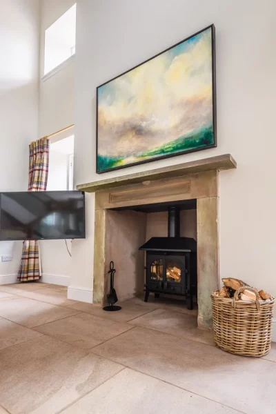 Cosy Log Burner in Lounge in Sir Walter Scott 2 Bedroom Self Catering Apartment