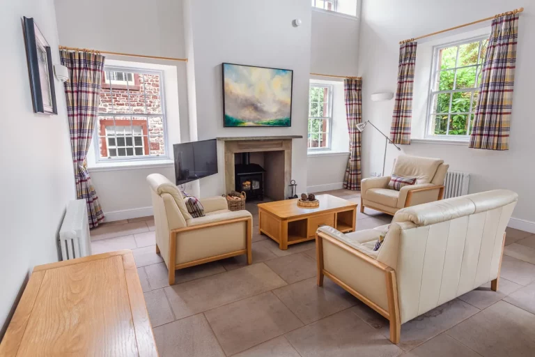 Lounge with Window Views and Seating Area in Sir Walter Scott Apartment