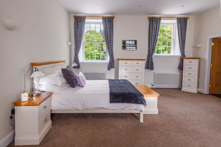 King Size Bed with Window Views in Sir Walter Scott Apartment