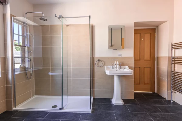 Shower and Sink in Salutation Apartment Bathroom