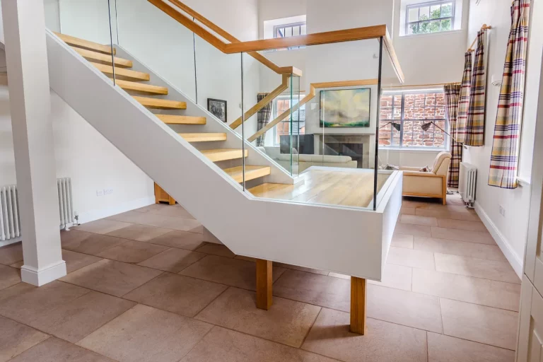 Glass Staircase and Lounge Area in Sir Walter Scott Apartment