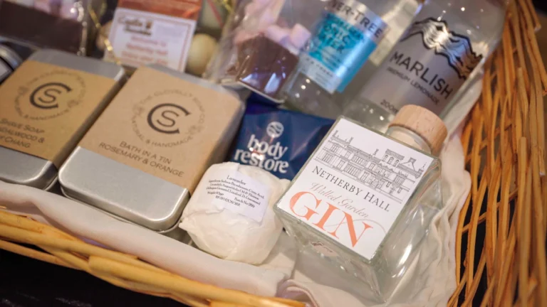 winter pamper pack including hot chocolate and marshmallows, miniature versions of Netherby Hall’s own gin (with tonic), and indulgent bath products