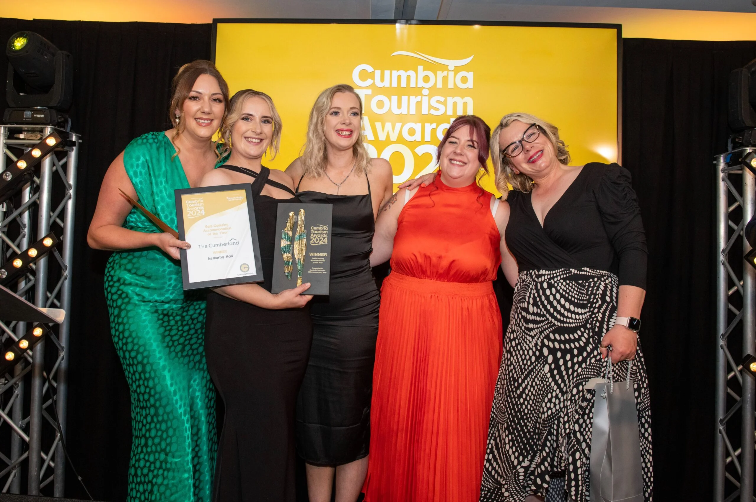 1. The Netherby Hall team collecting the award for self-catering accommodation of the year at the 2024 Cumbria Tourism Awards