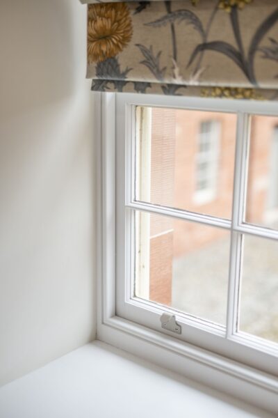 View through a window in the luxury Grooms' Quarters apartment at Netherby Hall, Cumbria