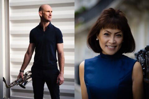 Huw Wiggin holding a saxophone and Noriko Ogawa smiling - Absolute Classics Music Concert at Netherby Hall 2026